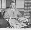 A Chapman sitting at his desk.tif (91032 bytes)